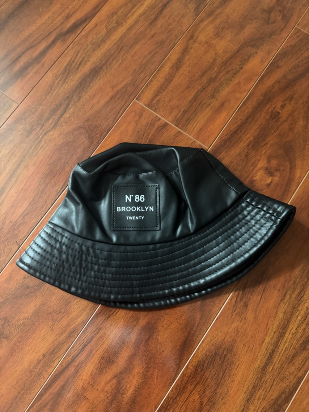 SHEIN Black Faux Leather Bucket Hat with Patch